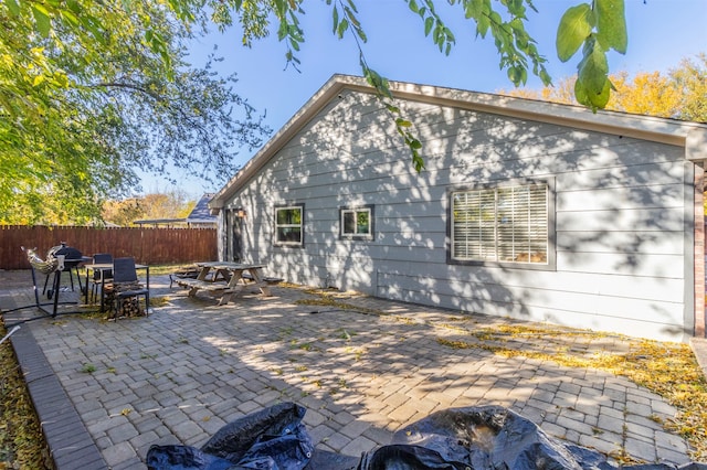 rear view of house with a patio