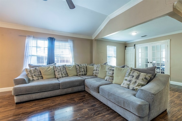 living room featuring a barn door, crown molding, lofted ceiling, and dark wood-type flooring