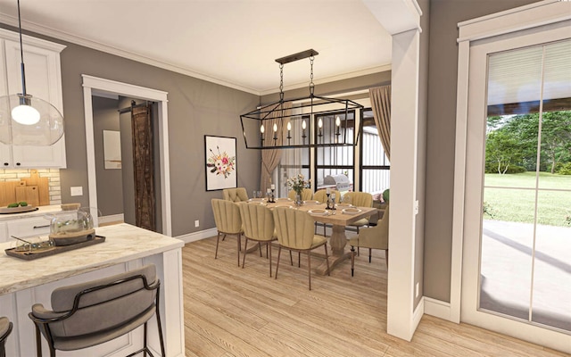 dining room featuring a notable chandelier, a barn door, light hardwood / wood-style floors, and crown molding