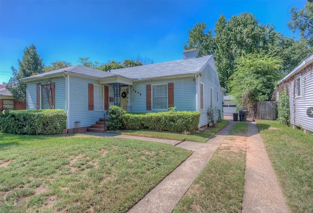 view of front of home featuring a front yard