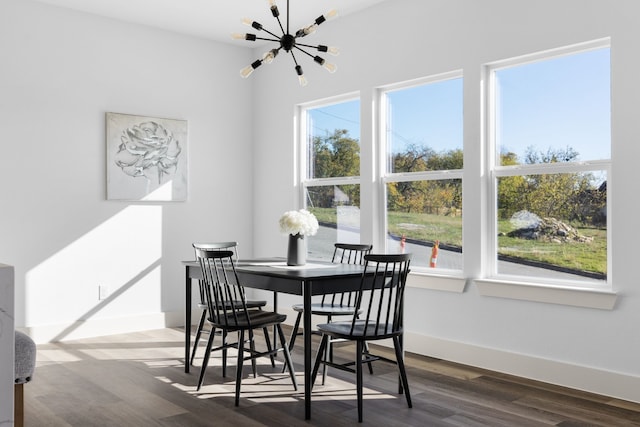 dining area featuring dark hardwood / wood-style floors