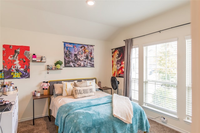 carpeted bedroom with vaulted ceiling