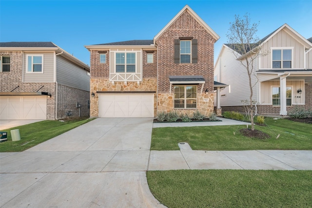 view of front of house featuring a garage and a front yard