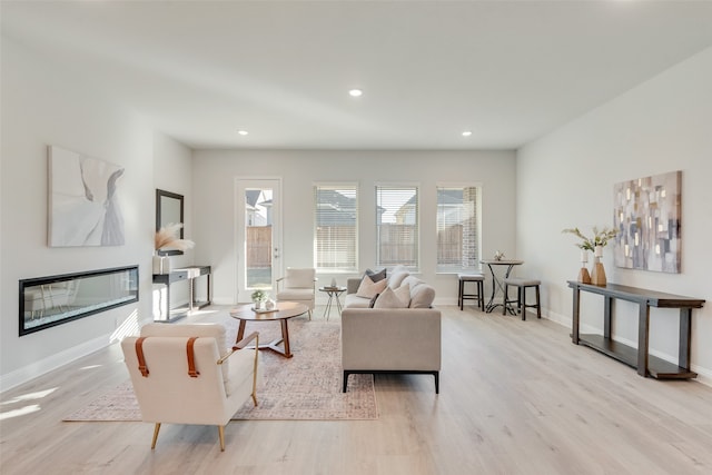 living room featuring light wood-type flooring