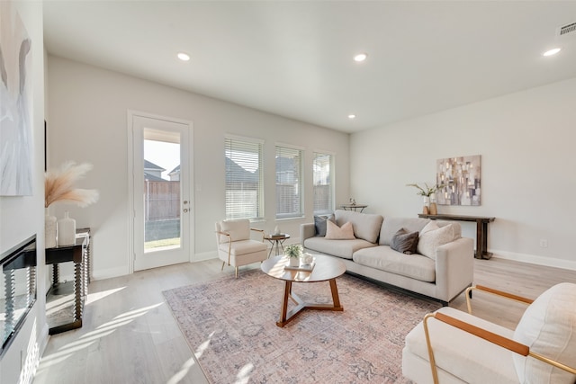 living room featuring light hardwood / wood-style floors