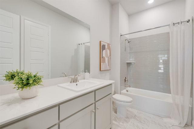 full bathroom with vanity, toilet, and shower / bath combo with shower curtain