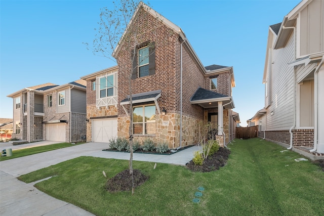 view of front facade featuring a front lawn and a garage