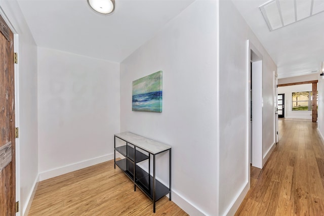 hallway featuring light hardwood / wood-style floors