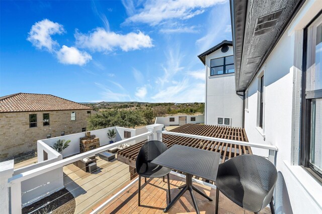 wooden balcony with a deck