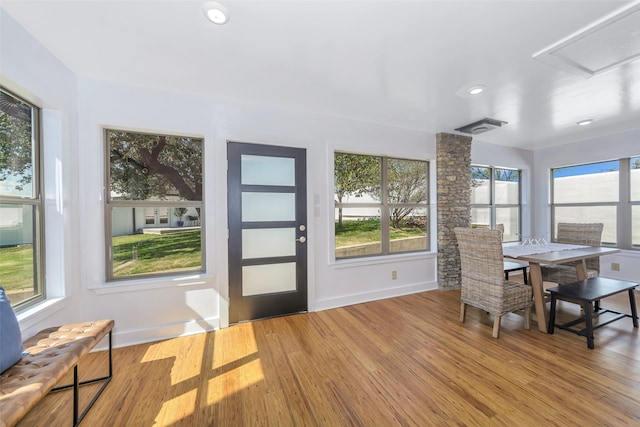 interior space featuring plenty of natural light and light hardwood / wood-style floors