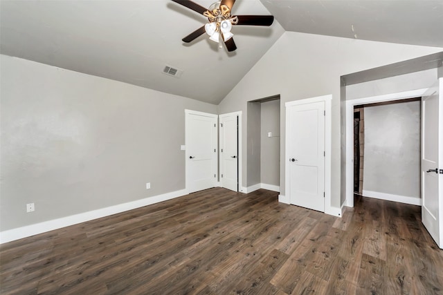 unfurnished bedroom with ceiling fan, dark hardwood / wood-style flooring, and vaulted ceiling