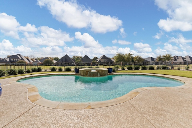 view of swimming pool with a patio and an in ground hot tub