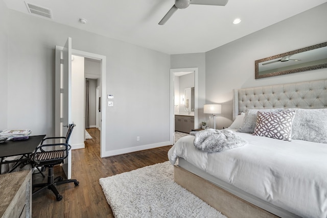 bedroom featuring connected bathroom, ceiling fan, and dark hardwood / wood-style flooring