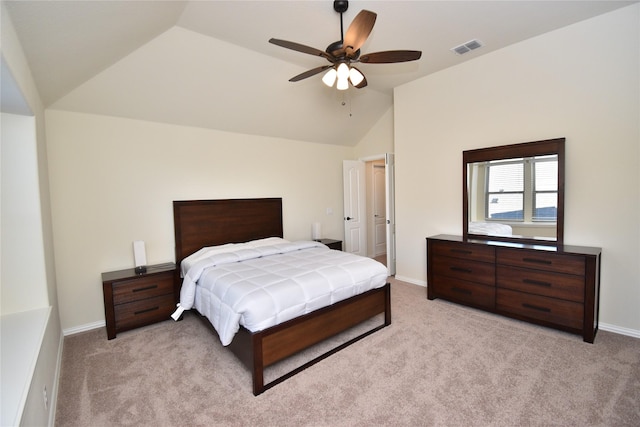 carpeted bedroom featuring vaulted ceiling and ceiling fan