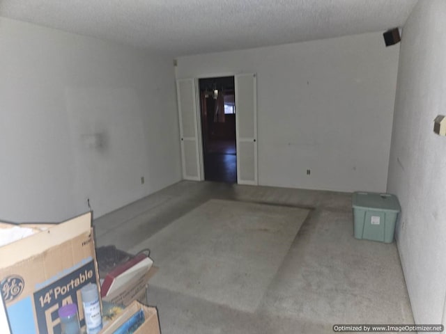 spare room featuring a textured ceiling