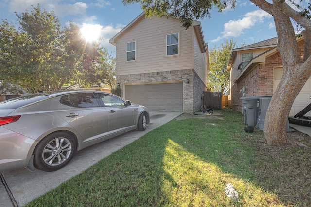 view of property exterior with a garage and a yard