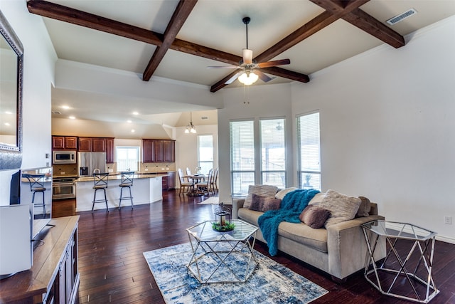 living room featuring beam ceiling, coffered ceiling, dark hardwood / wood-style floors, crown molding, and ceiling fan with notable chandelier