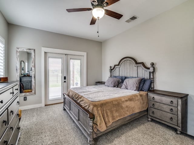 bedroom with access to exterior, ceiling fan, light colored carpet, and french doors