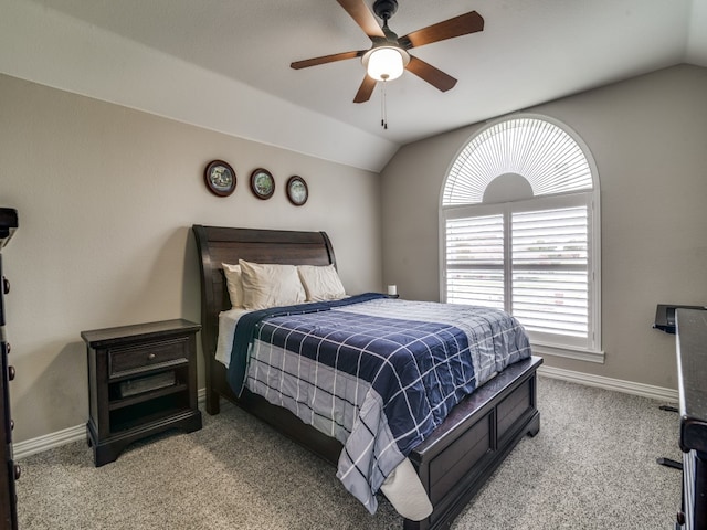 bedroom featuring ceiling fan, light carpet, and lofted ceiling