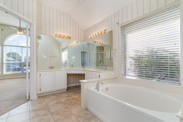 bathroom featuring vanity, plenty of natural light, lofted ceiling, and ceiling fan