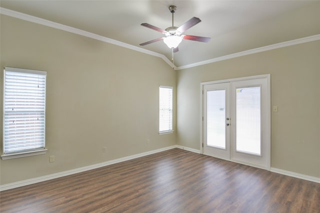 empty room featuring plenty of natural light, ceiling fan, dark hardwood / wood-style flooring, and french doors