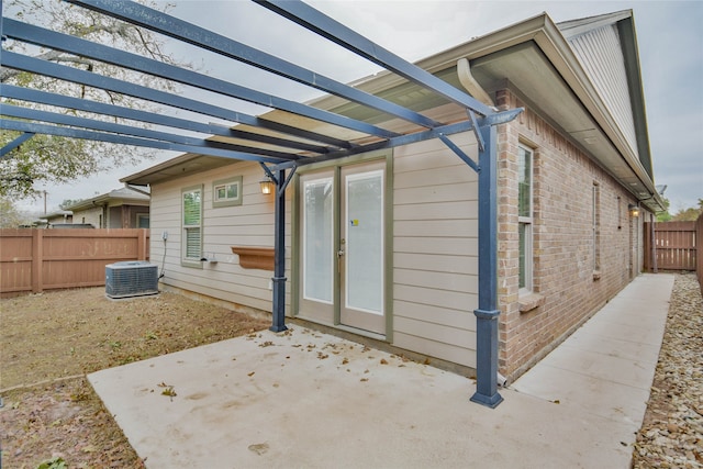 exterior space with a pergola, a patio, and central AC