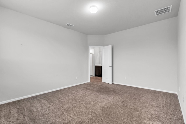 spare room with carpet flooring