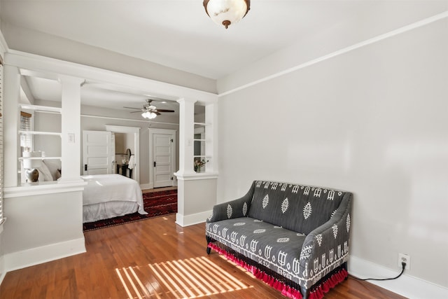 bedroom featuring ceiling fan and hardwood / wood-style flooring