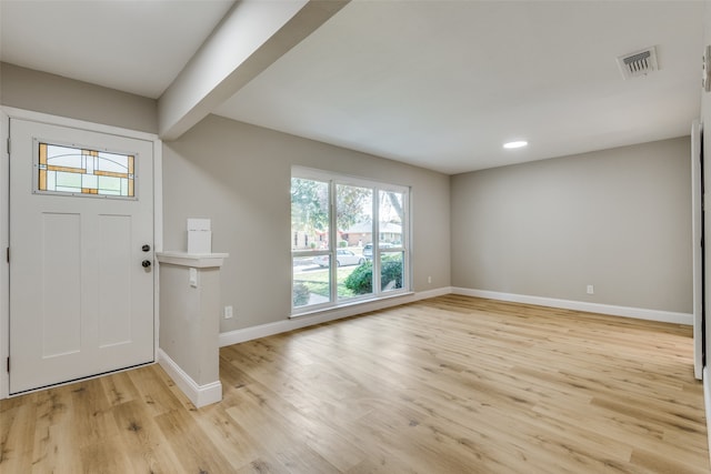 foyer with light hardwood / wood-style flooring