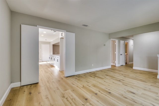 empty room featuring light hardwood / wood-style floors