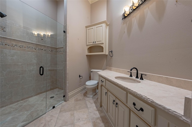 bathroom with vanity, walk in shower, and toilet