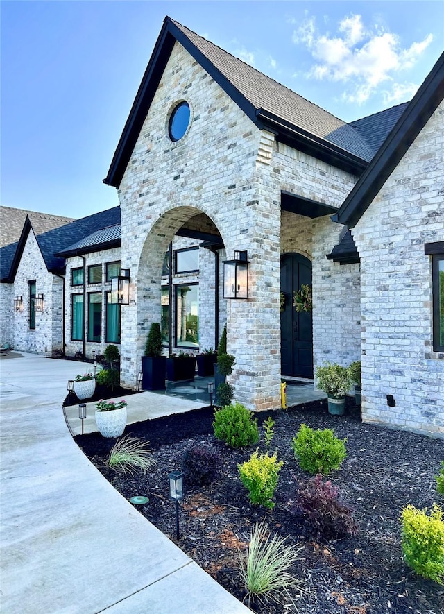 401 Cd Trl, Weatherford, TX 76087 - view of front of home with a shingled roof and brick siding