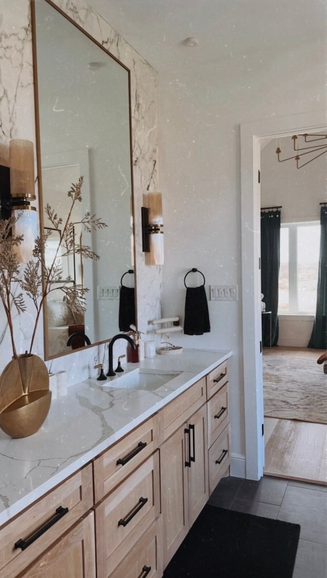 bathroom with vanity and tile patterned floors