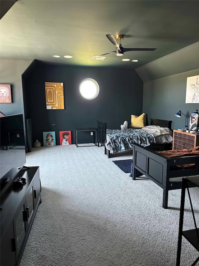 bedroom featuring carpet floors, ceiling fan, and vaulted ceiling