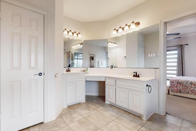 bathroom featuring vanity and tile patterned flooring