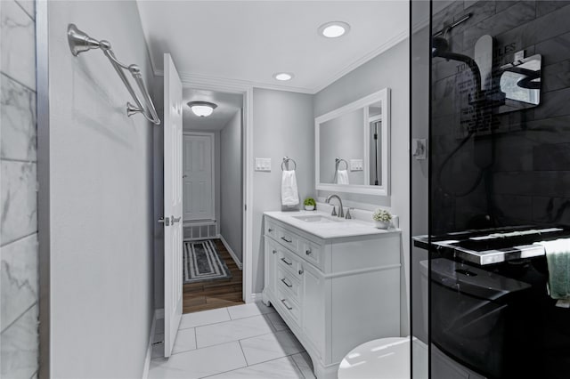 bathroom with vanity, ornamental molding, and walk in shower