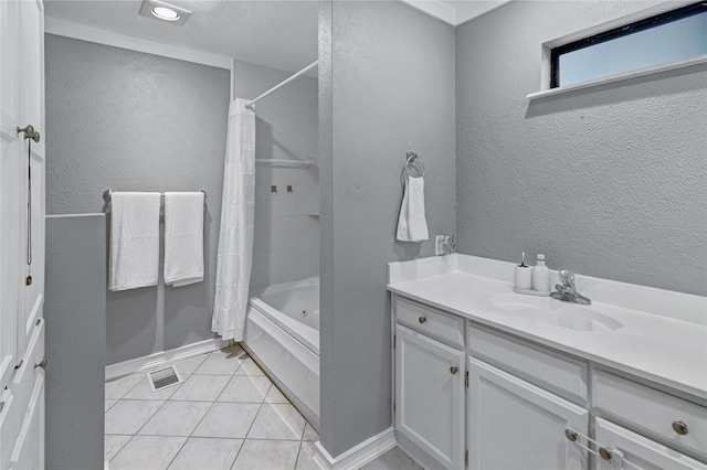 bathroom with tile patterned flooring, vanity, and shower / tub combo with curtain