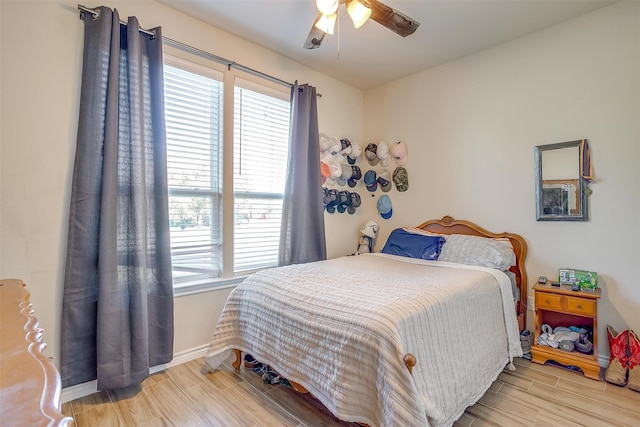 bedroom featuring ceiling fan and light hardwood / wood-style floors