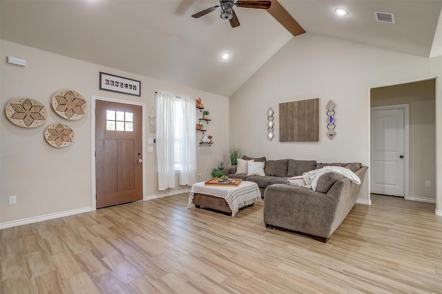 living room featuring ceiling fan, high vaulted ceiling, and light wood-type flooring