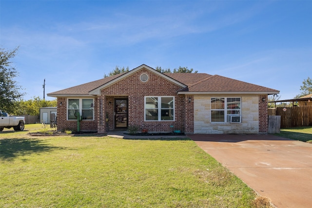 ranch-style house with a front lawn and cooling unit