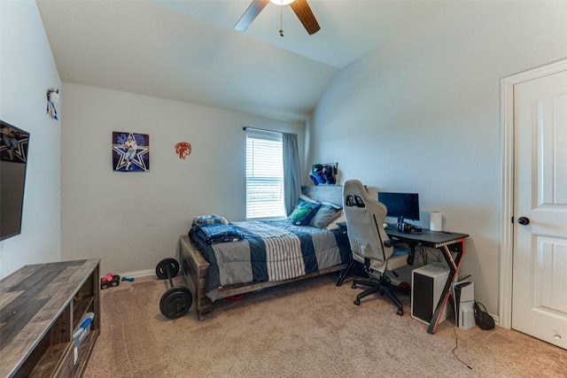 carpeted bedroom with vaulted ceiling and ceiling fan