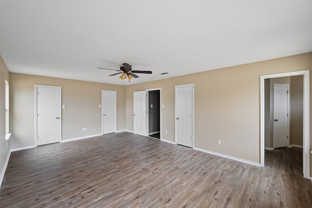 interior space with hardwood / wood-style floors and ceiling fan