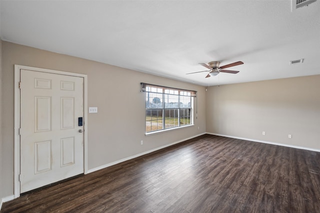 interior space with dark hardwood / wood-style floors and ceiling fan