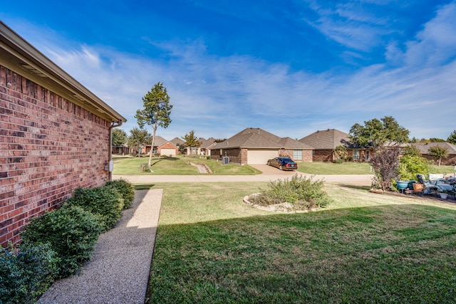 view of yard featuring a garage