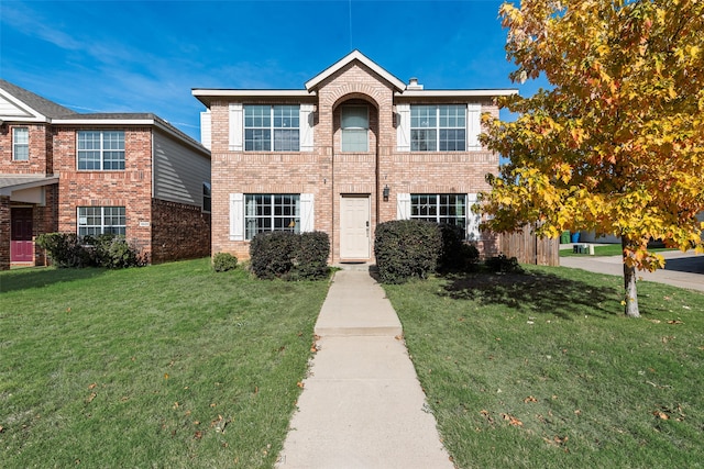 view of front of house featuring a front lawn