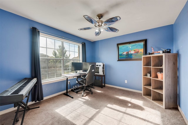 office area featuring carpet flooring and ceiling fan