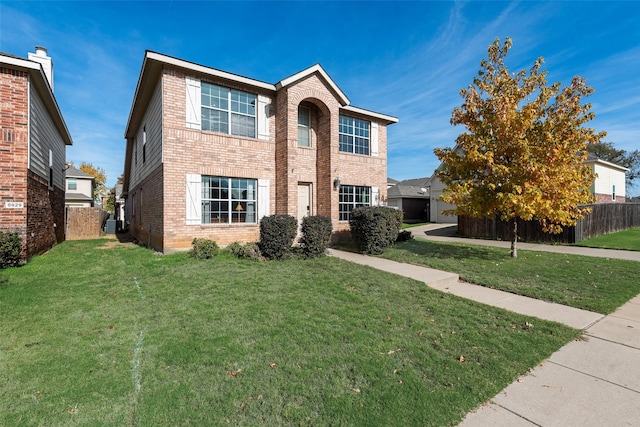 view of front facade with a front yard