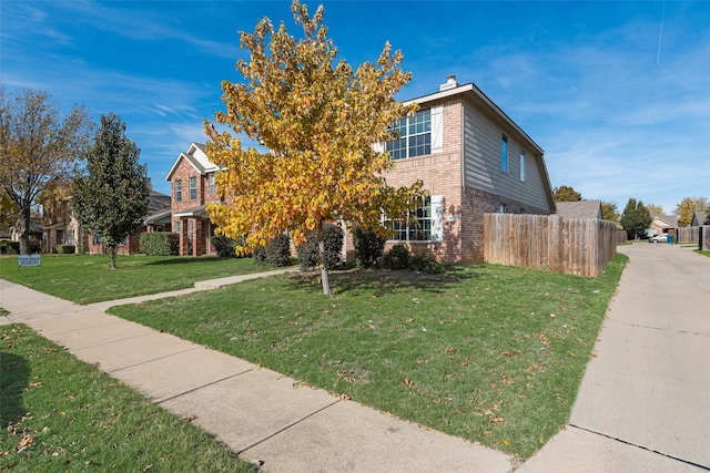 view of front of house featuring a front lawn