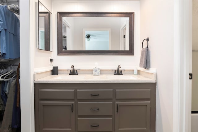 bathroom with vanity and ceiling fan