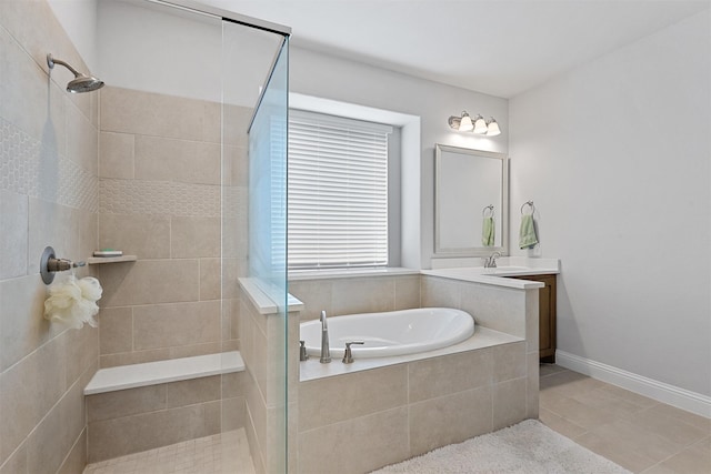 bathroom with vanity, tile patterned floors, and separate shower and tub